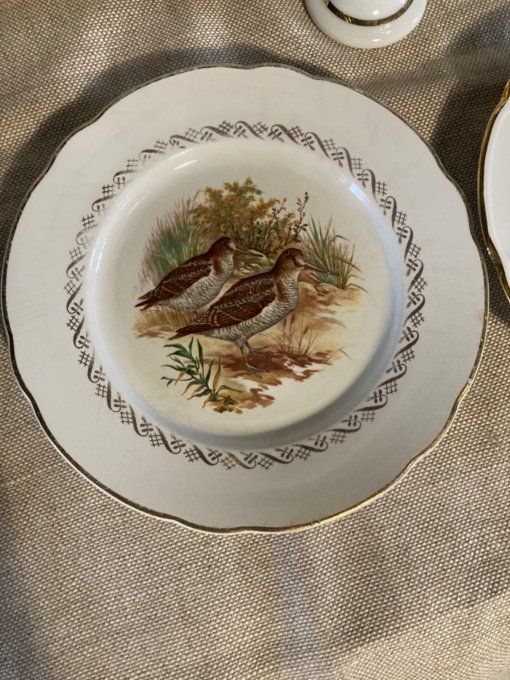 Ensemble assiettes  et massagran faisans, porcelaine de limoges