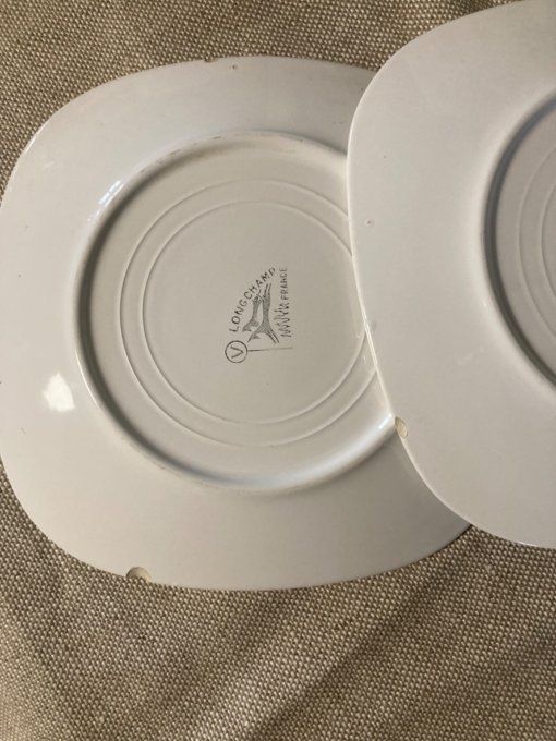 9 assiettes faïencerie longchamp à décors de faisans, perdreaux et bécasses