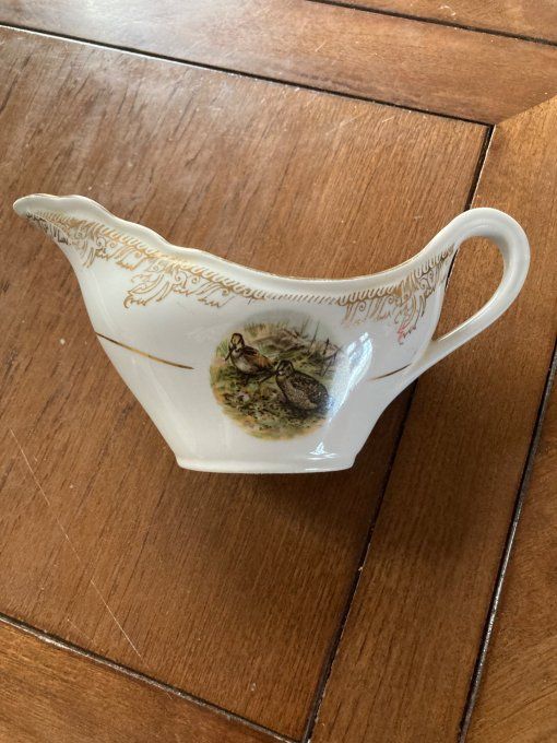Saucière en porcelaine à décor de faisan et becasses