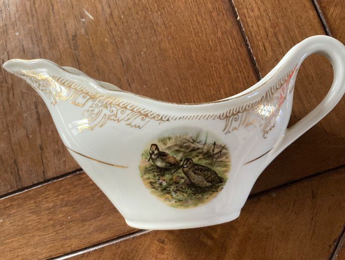 Saucière en porcelaine à décor de faisan et becasses
