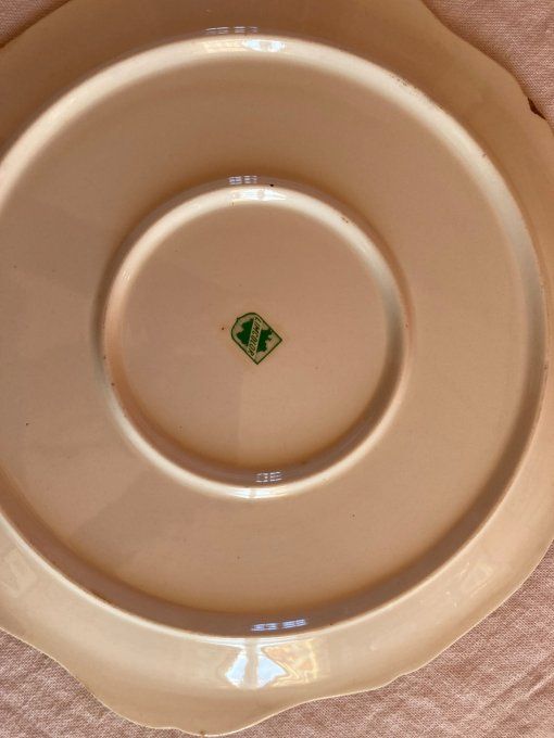 Plat rond à décor de gibiers, becasse au centre  Limcolor