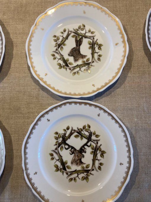 Ensemble de vaisselles en porcelaine de Couleuvre. 10 assiettes + plat + saucière