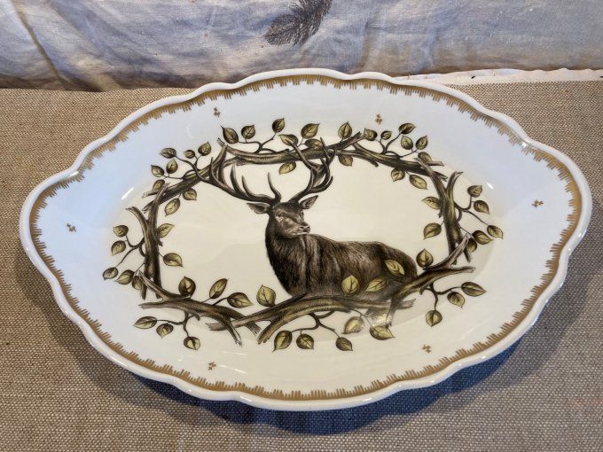 Ensemble de vaisselles en porcelaine de Couleuvre. 10 assiettes + plat + saucière