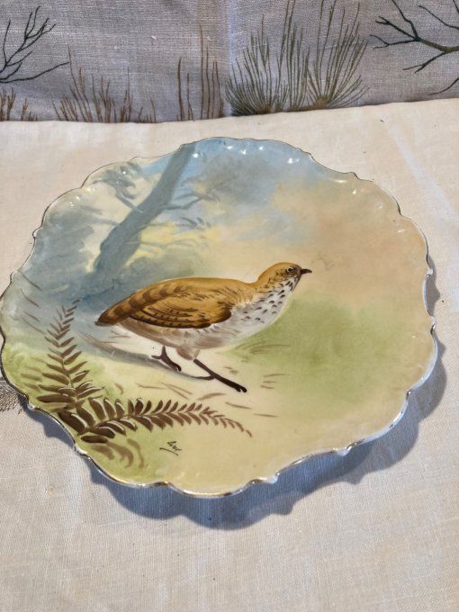 Assiette porcelaine à décor de perdrix 