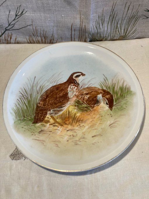 2 assiettes à décor de perdrix 
