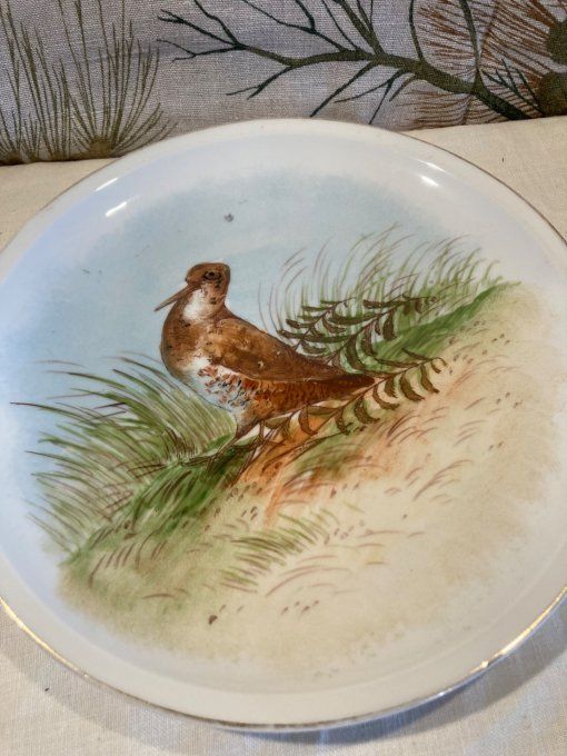 2 assiettes à décor de perdrix 